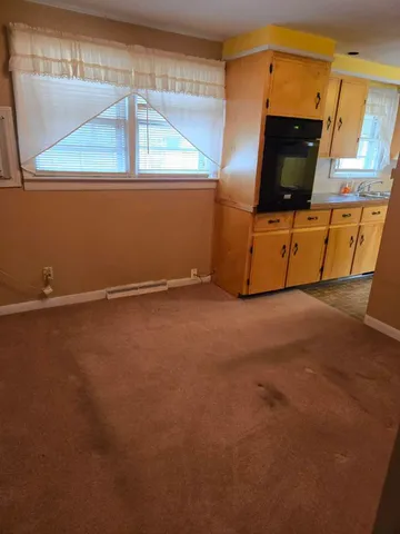 a view of a room with rack on the wall