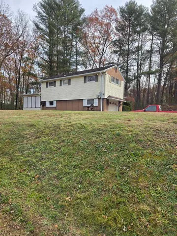 a house view with a outdoor space