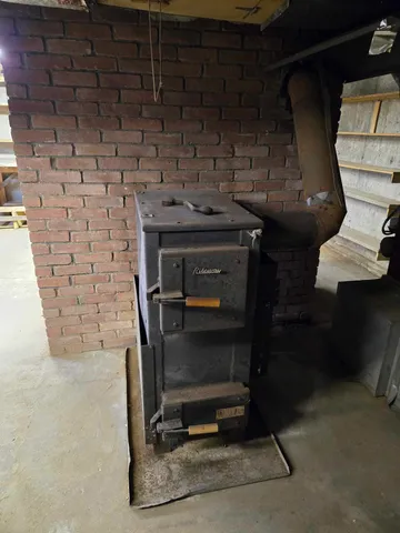 a kitchen with a stove and cabinets