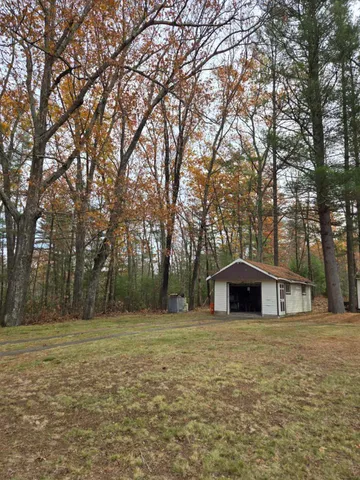 a house with trees in front of it