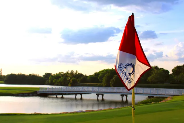 a very nice looking living room with furniture and a large window