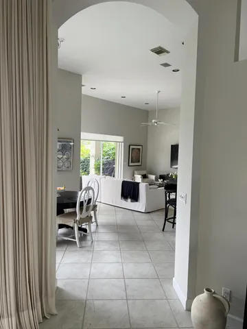 a view of kitchen with furniture and dining table