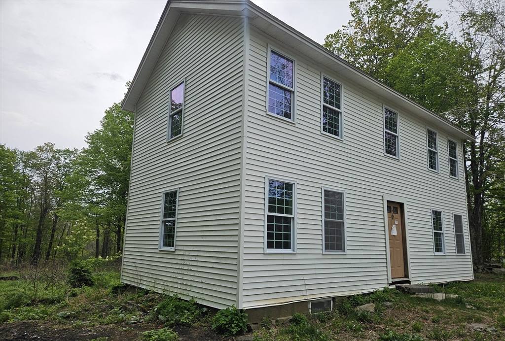 1 Crane Road Chester, MA 01011 - Photo 2 of 12 a view of a house with a yard