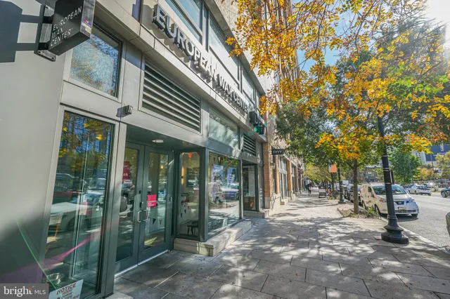 a view of street with sitting area