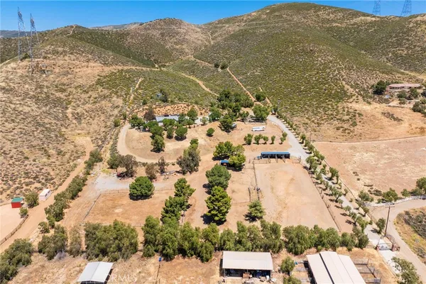 a view of a yard with a mountain