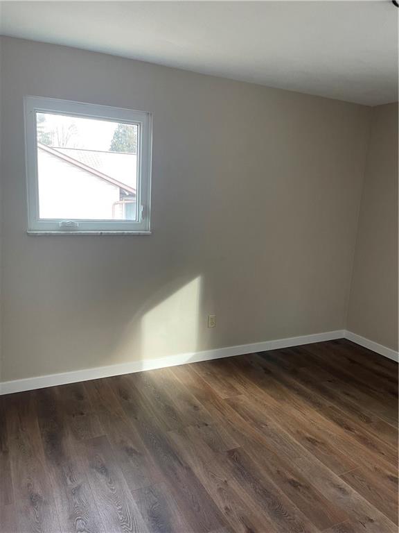 150 Watson Road Apollo, PA 15613 - Photo 14 of 21 an empty room with wooden floor and windows