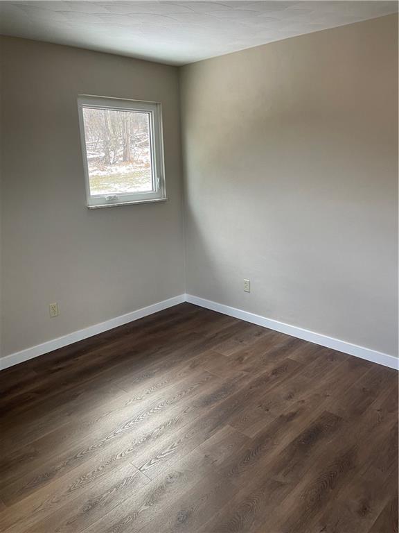 150 Watson Road Apollo, PA 15613 - Photo 15 of 21 an empty room with wooden floor and windows