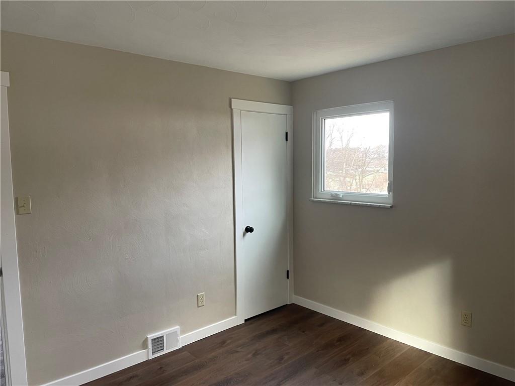 150 Watson Road Apollo, PA 15613 - Photo 17 of 21 an empty room with wooden floor and windows