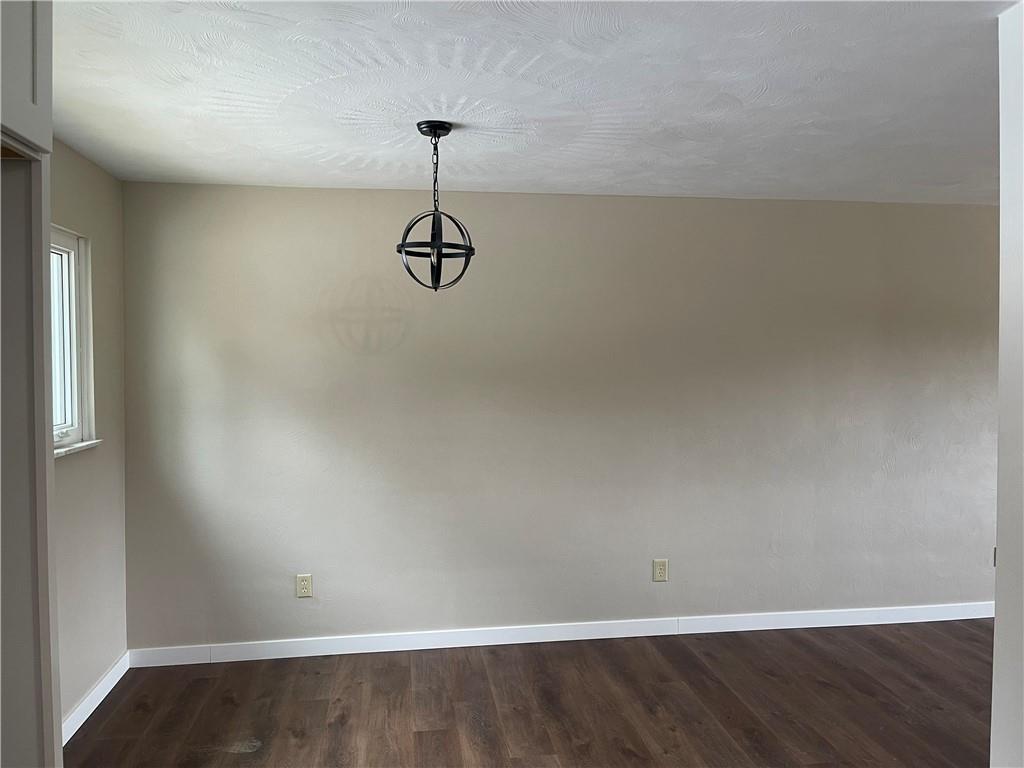 150 Watson Road Apollo, PA 15613 - Photo 10 of 21 a view of a room with hardwood floor and a ceiling fan