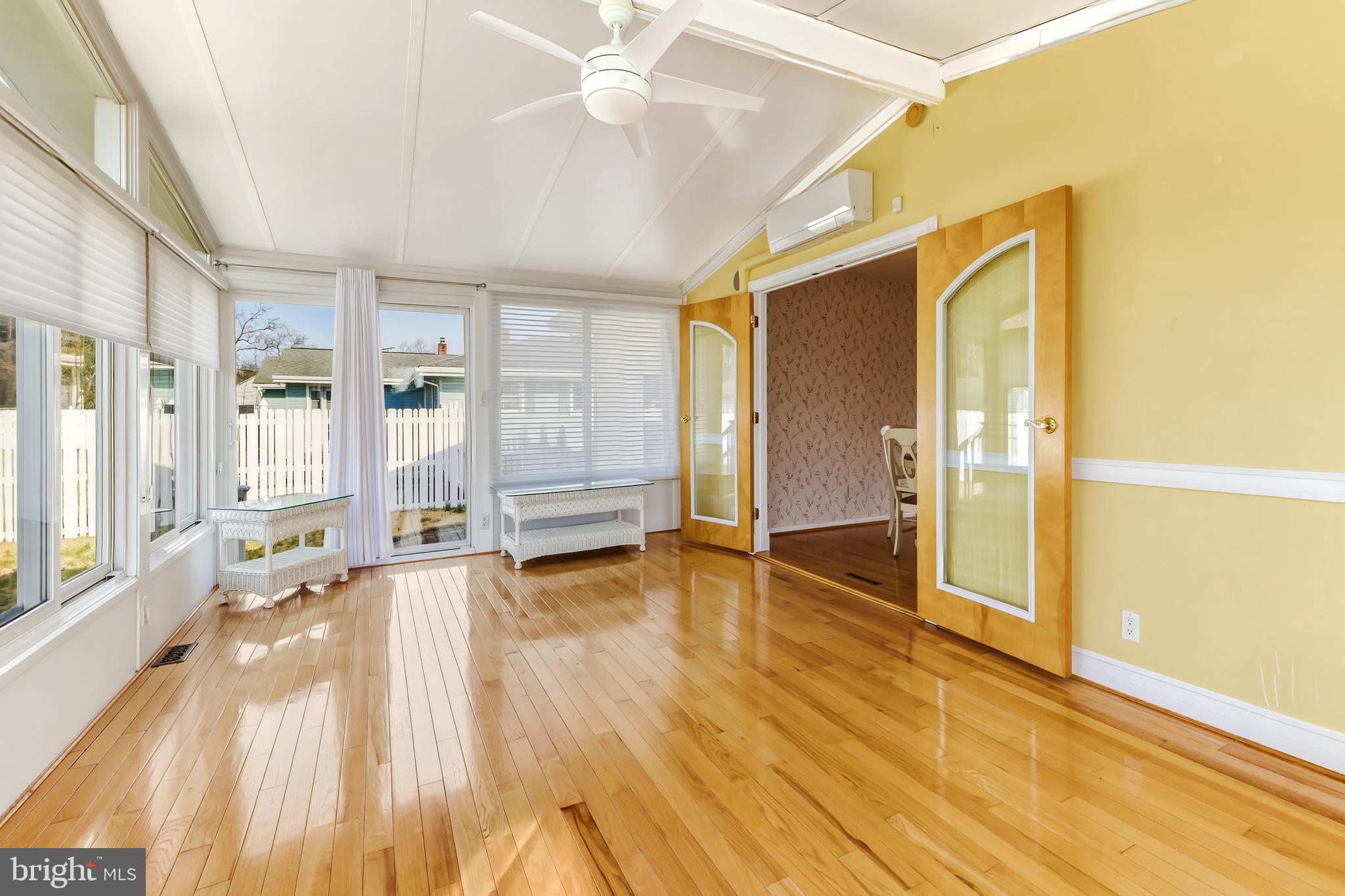 Beautiful hardwood flooring and lots of windows