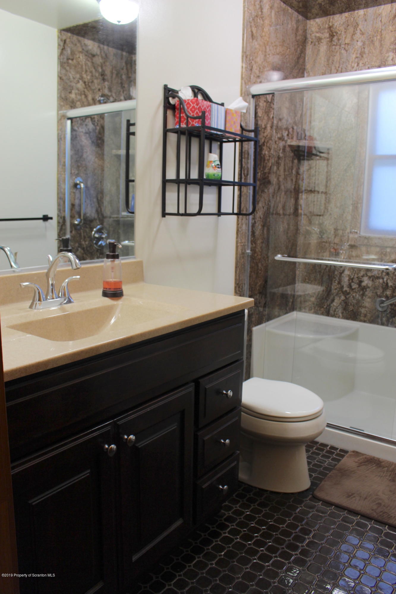 1603 Oak Ridge Road Mehoopany, PA 18629 - Photo 13 of 52 a bathroom with a sink and a toilet