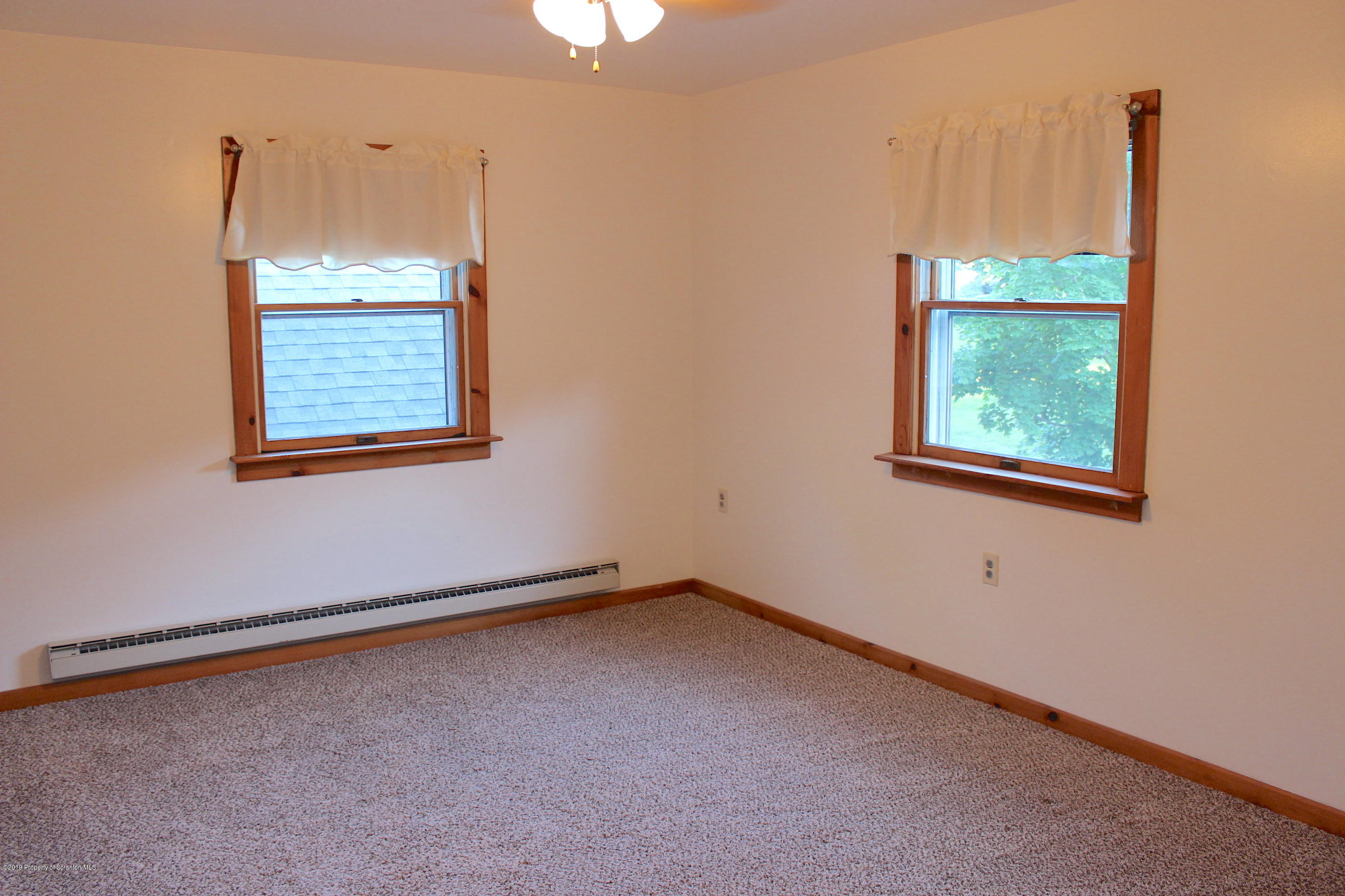 1603 Oak Ridge Road Mehoopany, PA 18629 - Photo 18 of 52 an empty room with a window