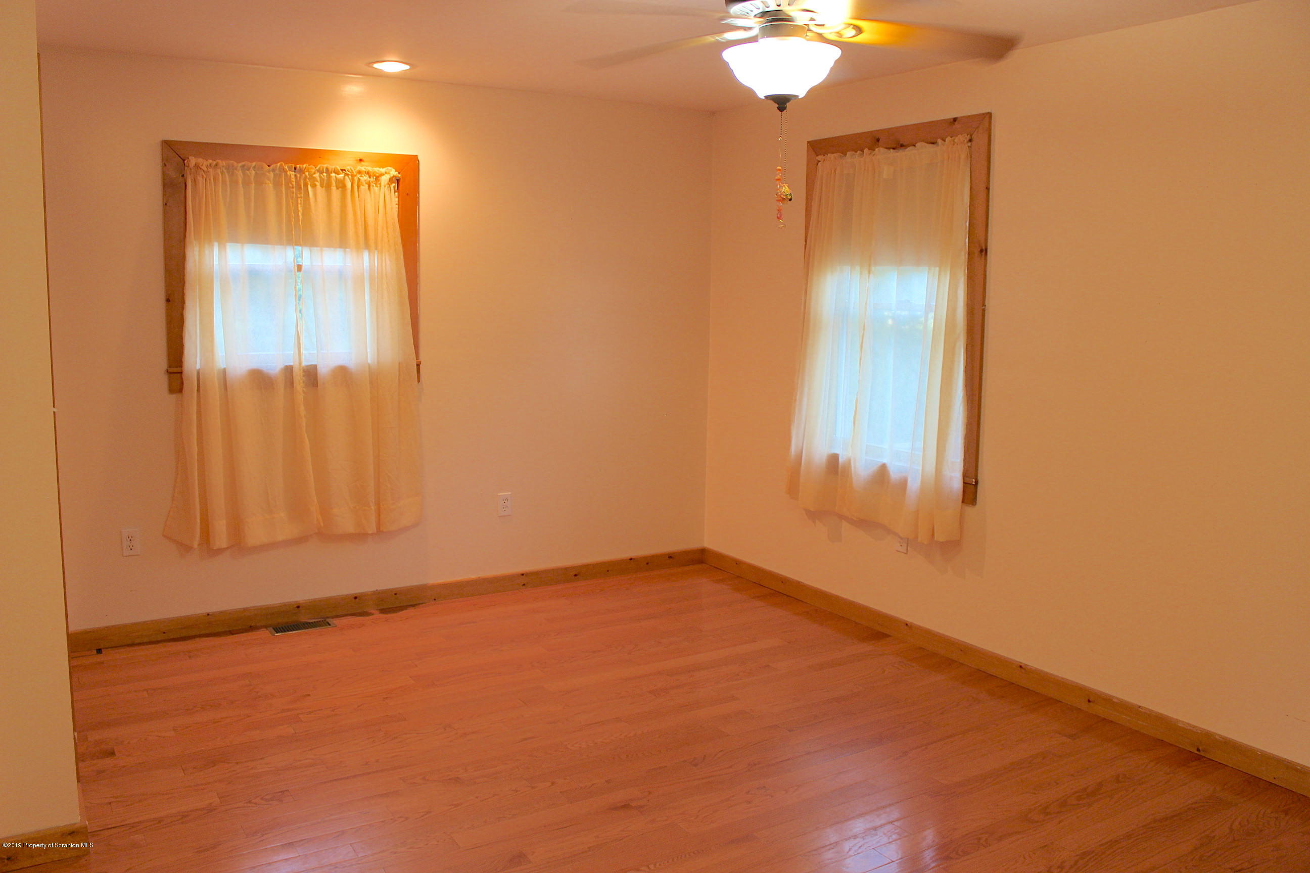 1603 Oak Ridge Road Mehoopany, PA 18629 - Photo 20 of 52 an empty room with windows and closet