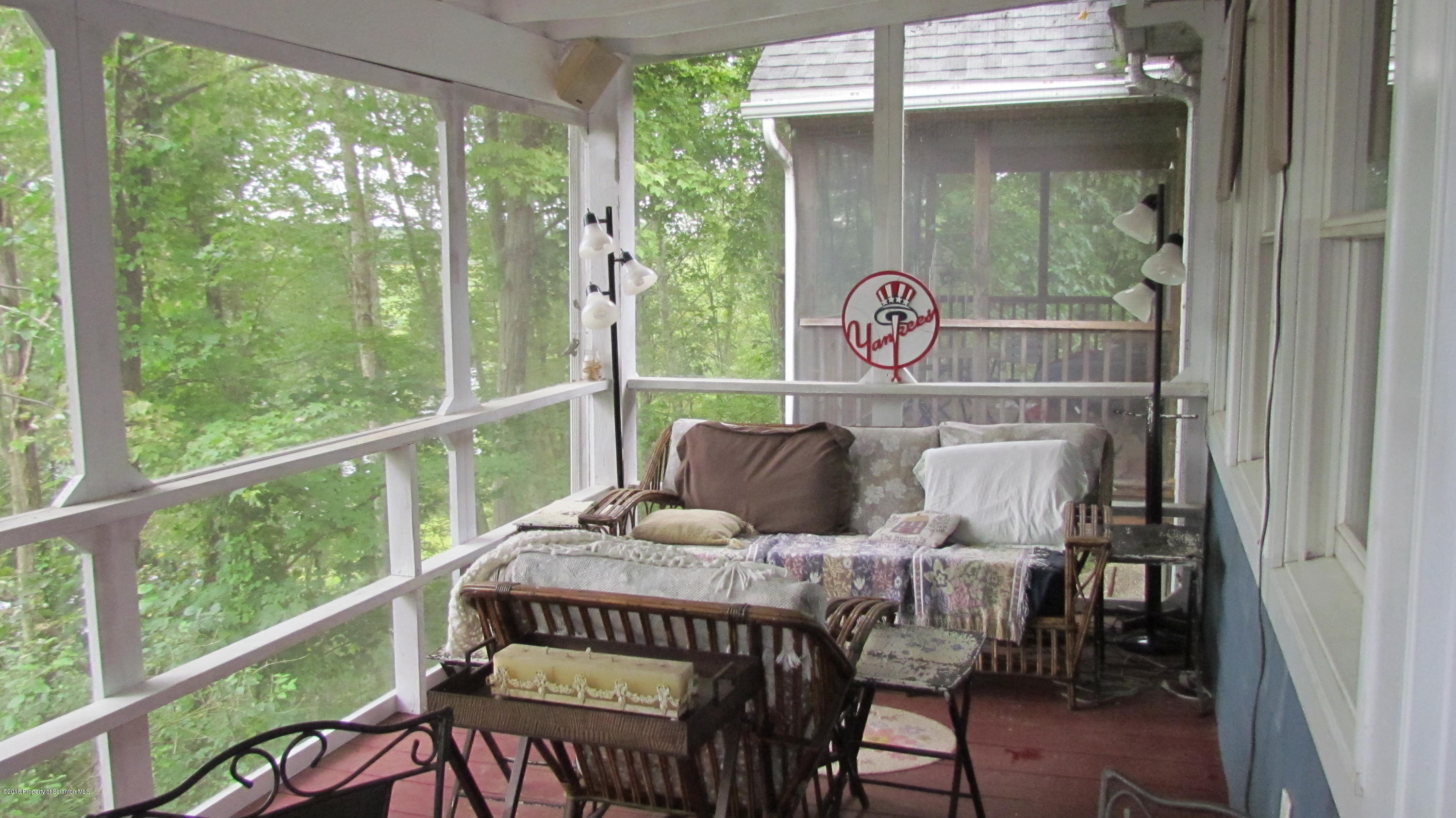1603 Oak Ridge Road Mehoopany, PA 18629 - Photo 7 of 52 a bedroom with a bed and a window