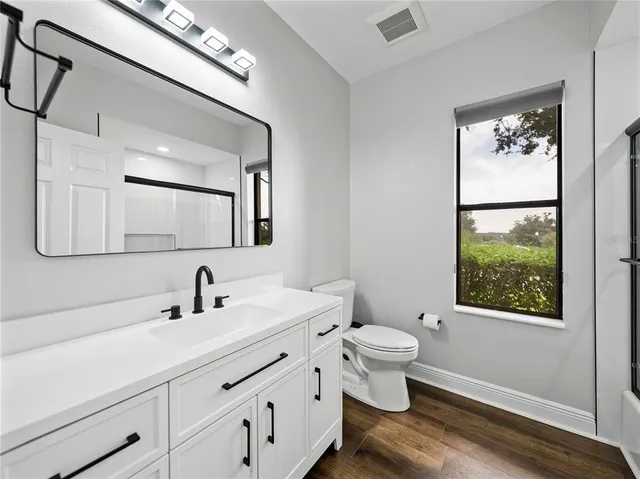 a view of a garden with an outdoor space