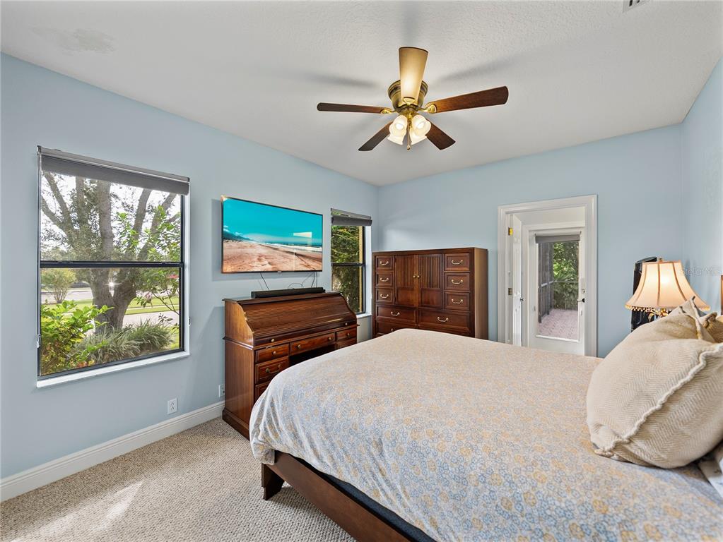 34120 Americana Avenue Dade City, FL 33525 - Photo 44 of 71 a bedroom with a large bed and a window