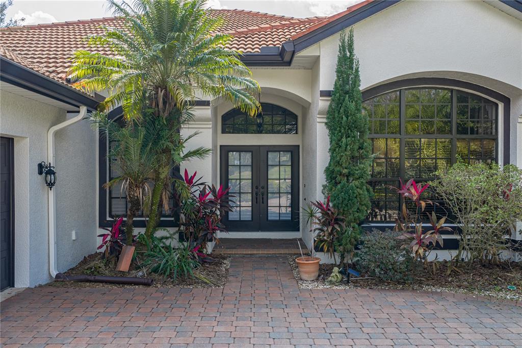 34120 Americana Avenue Dade City, FL 33525 - Photo 9 of 71 a front view of a house