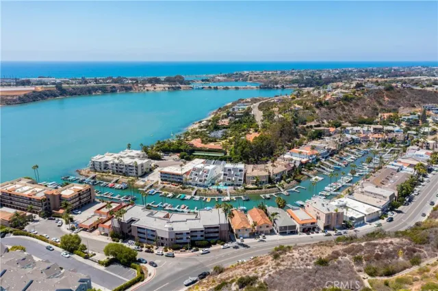 an aerial view of a houses with outdoor space