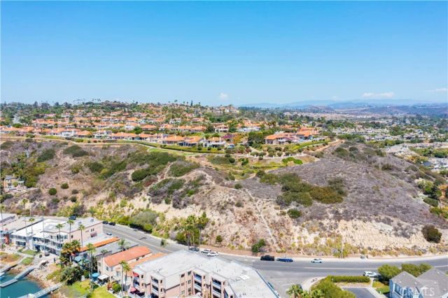 an aerial view of residential building with parking space