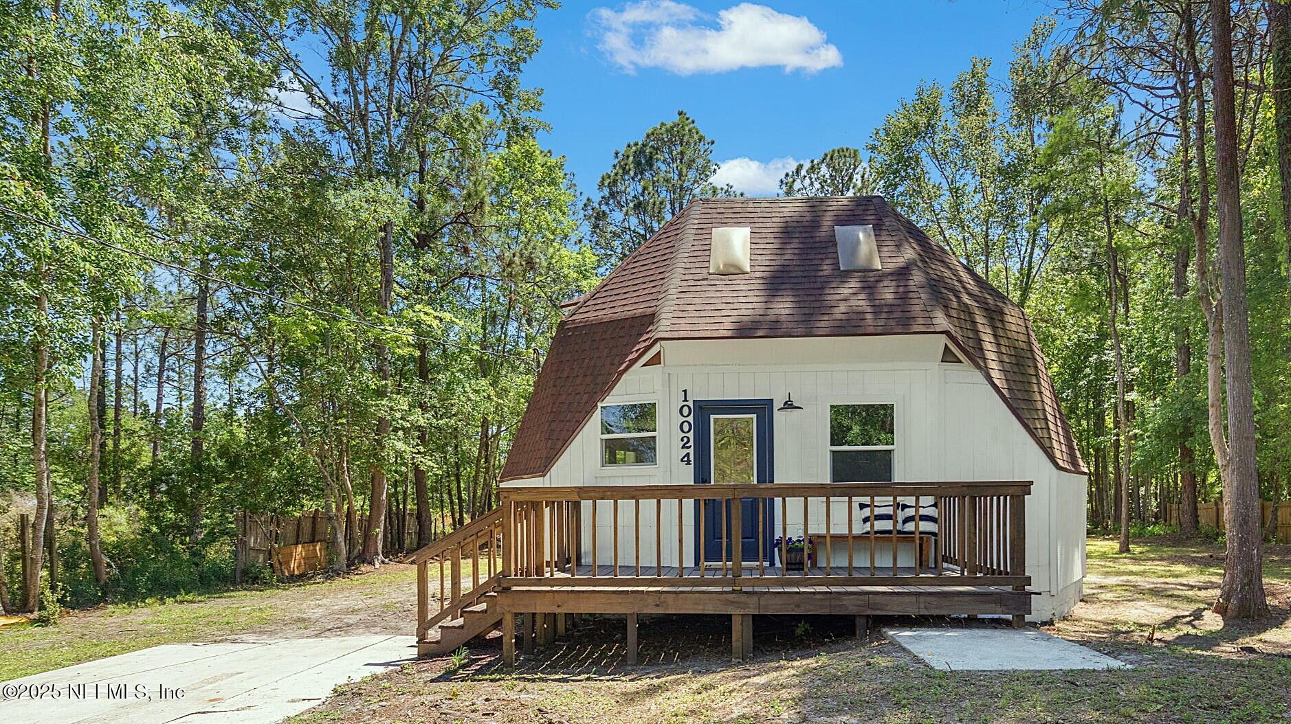 a house view with a garden space