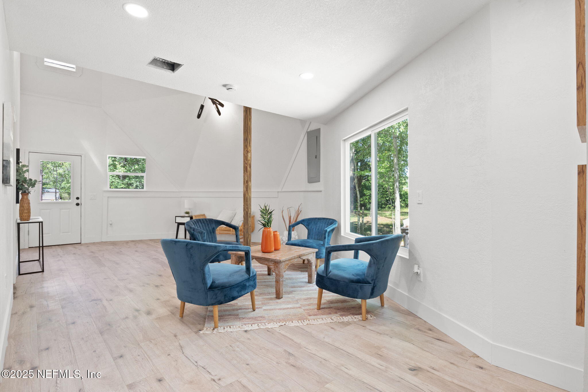 10024 Sandler Road Jacksonville, FL 32222 - Photo 11 of 40 a living room with furniture and a window