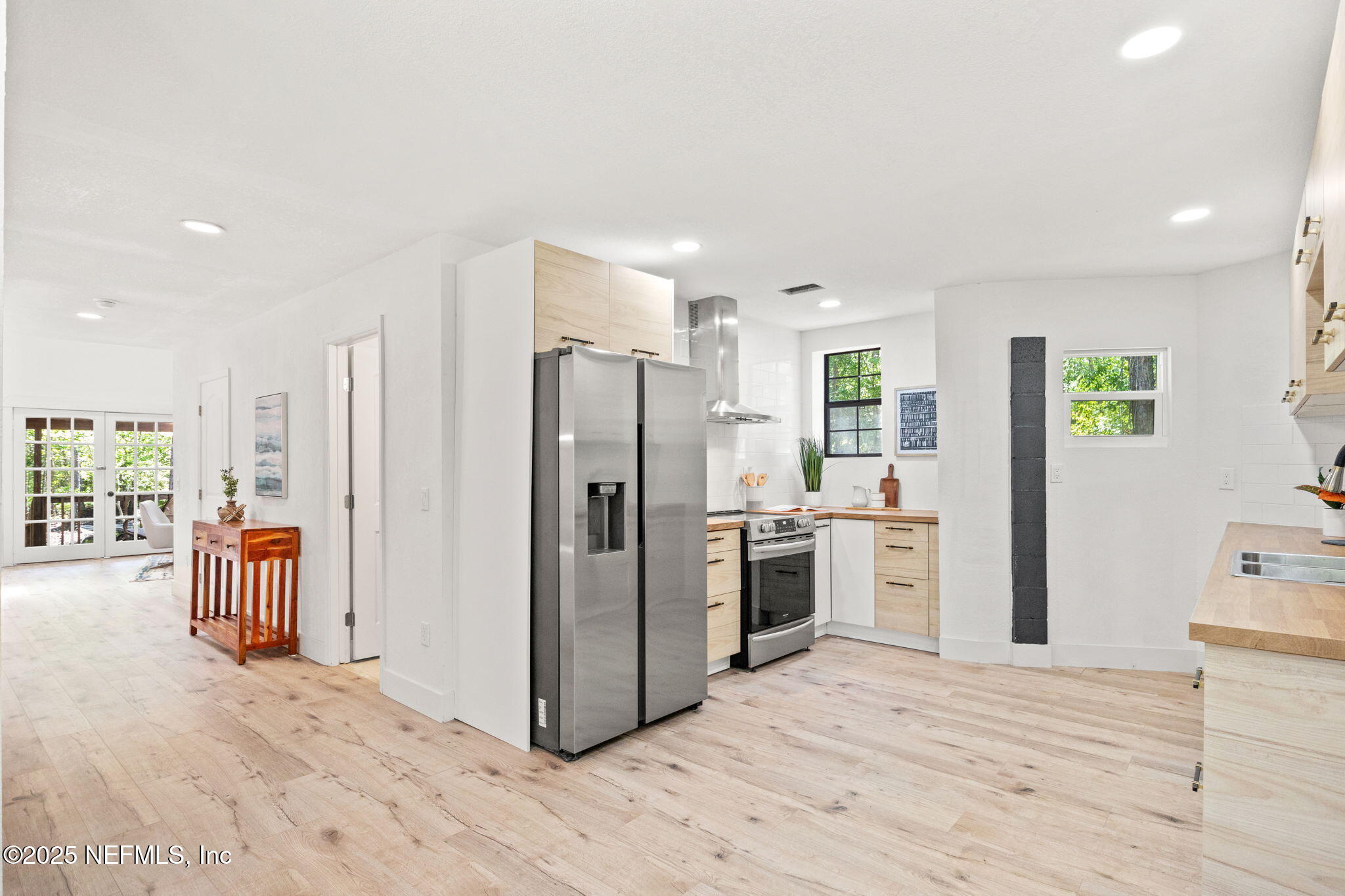 10024 Sandler Road Jacksonville, FL 32222 - Photo 16 of 40 a kitchen with stainless steel appliances a refrigerator and a stove