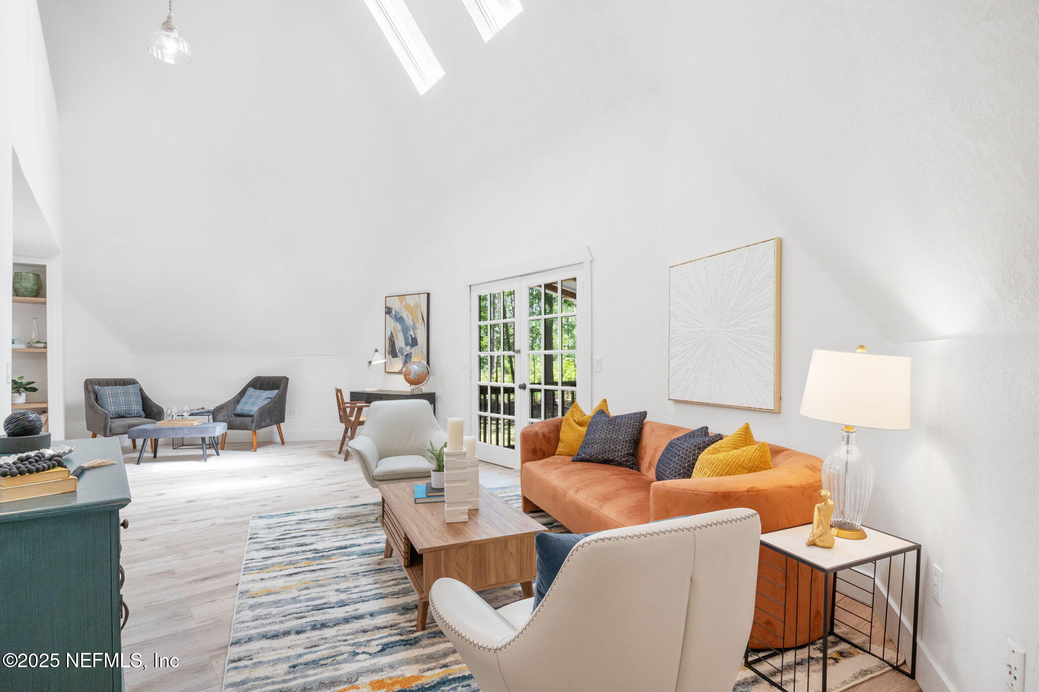 10024 Sandler Road Jacksonville, FL 32222 - Photo 22 of 40 a living room with furniture and a window