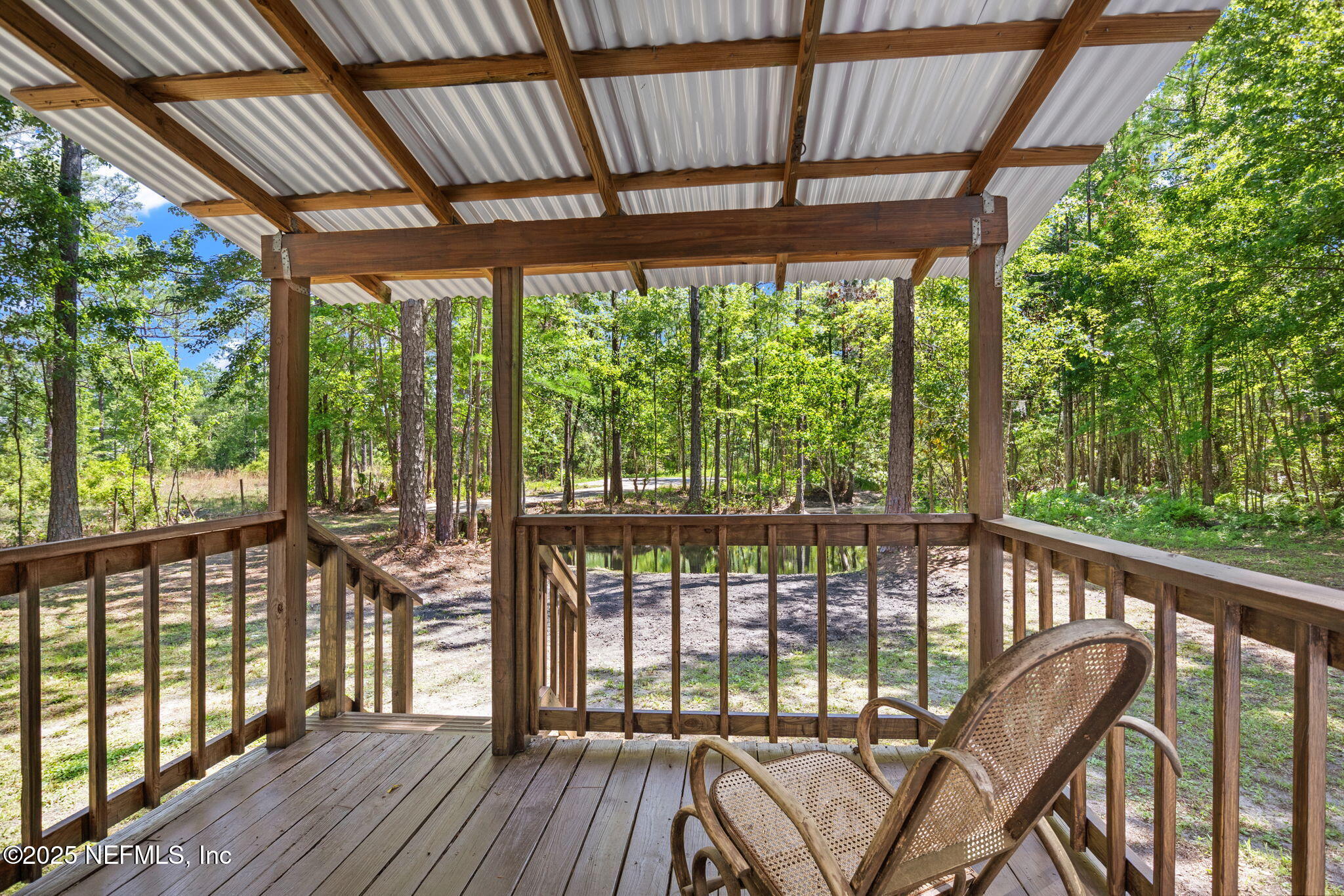 10024 Sandler Road Jacksonville, FL 32222 - Photo 30 of 40 a view of a patio with wooden floor