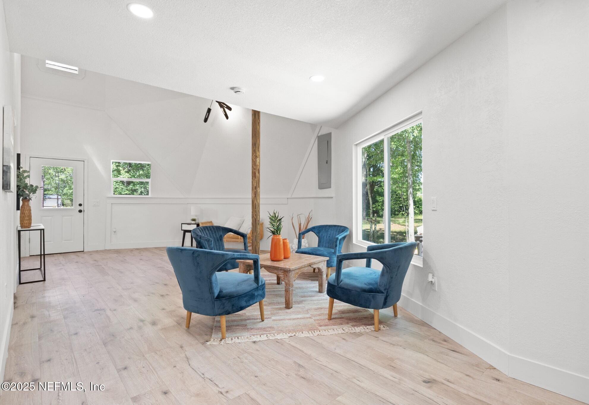10024 Sandler Road Jacksonville, FL 32222 - Photo 5 of 40 a living room with furniture and window