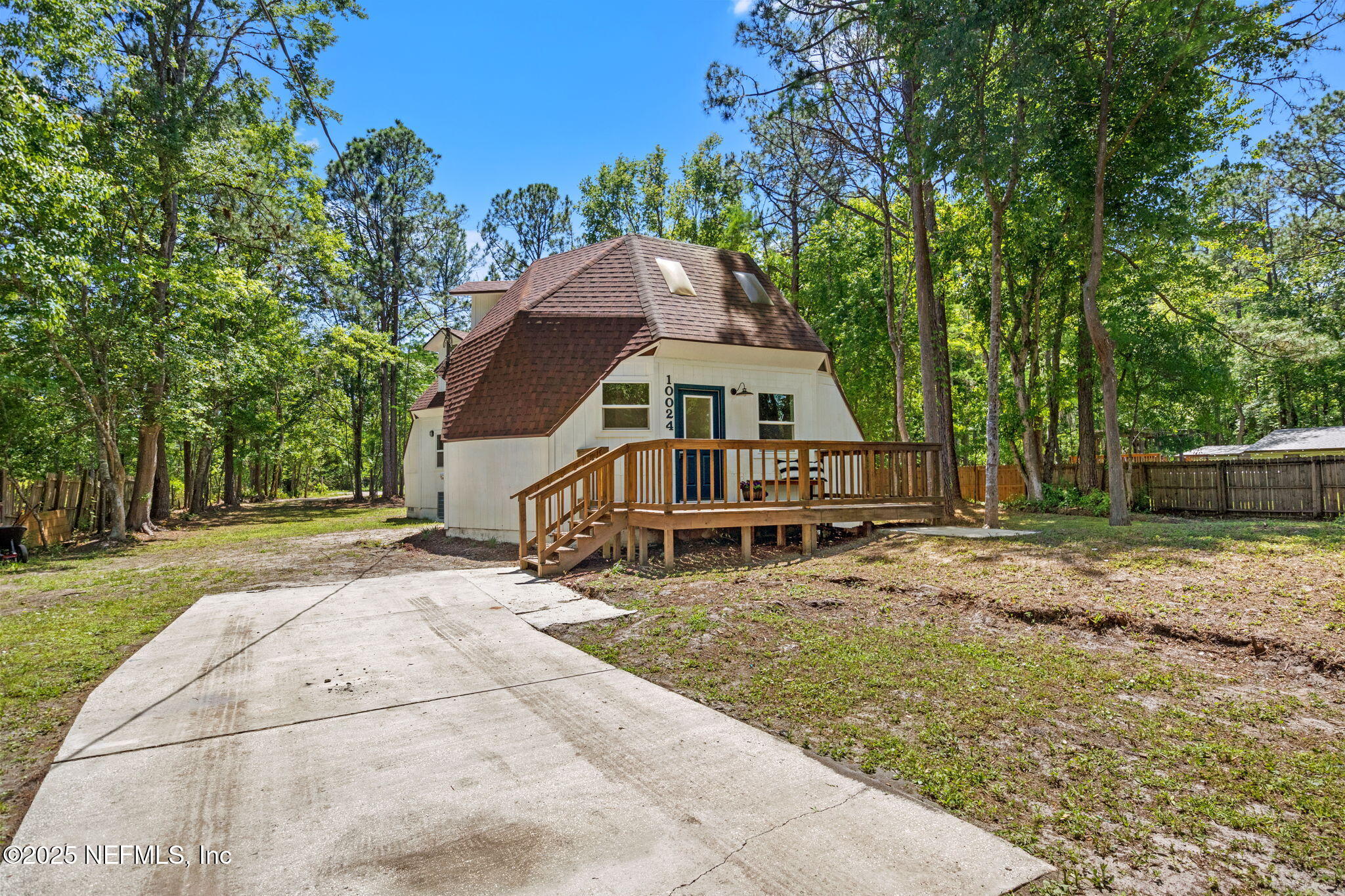 10024 Sandler Road Jacksonville, FL 32222 - Photo 7 of 40 a house with trees in the background