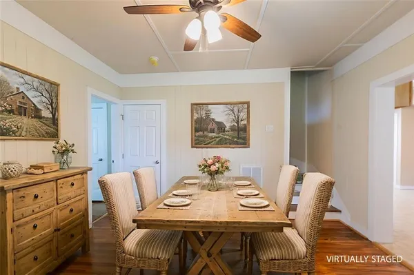 a view of a dining room with furniture