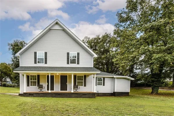 a view of a house with garden
