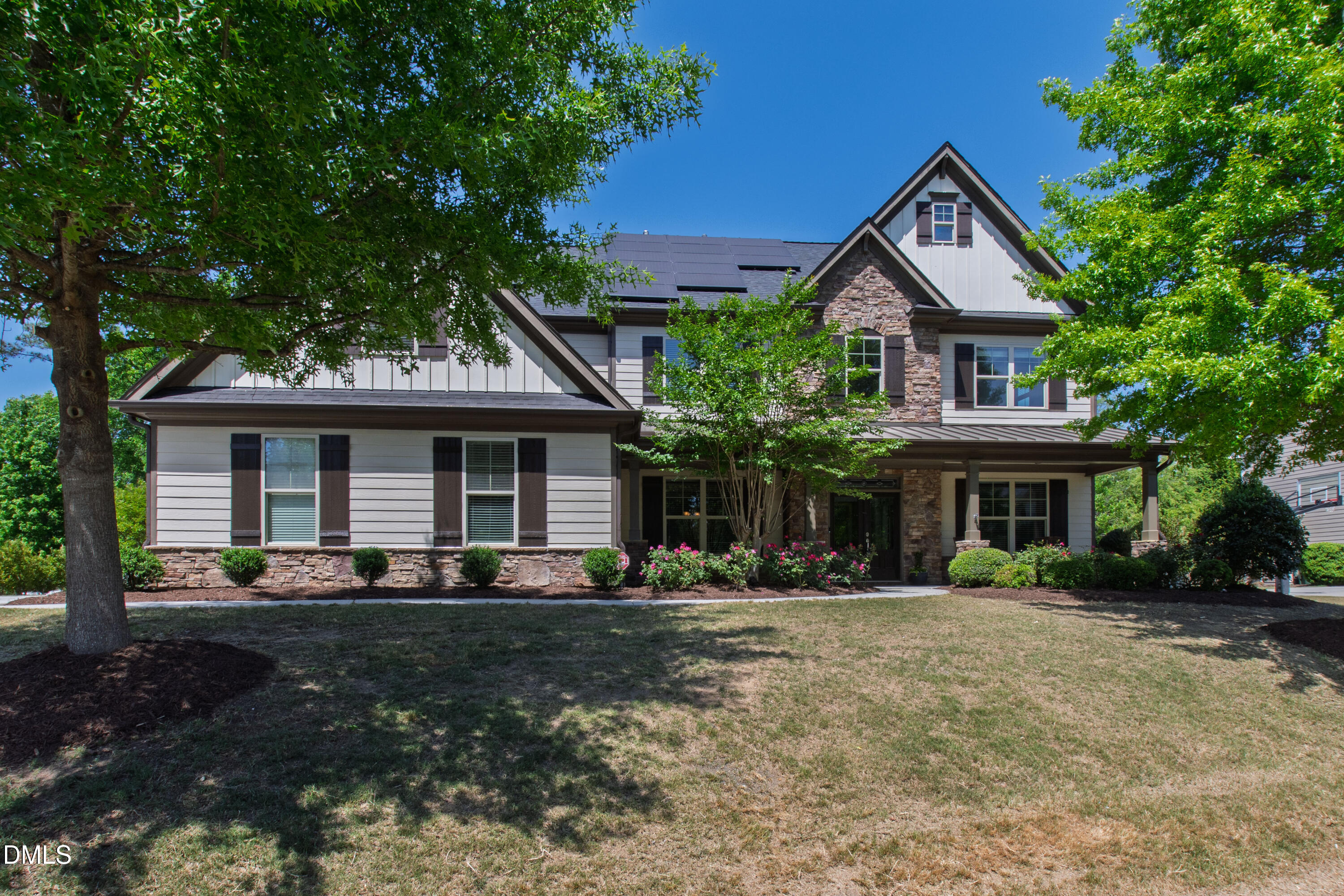 313 Karpen Lane Cary, NC 27519 - Photo 1 of 86 a front view of a house with garden