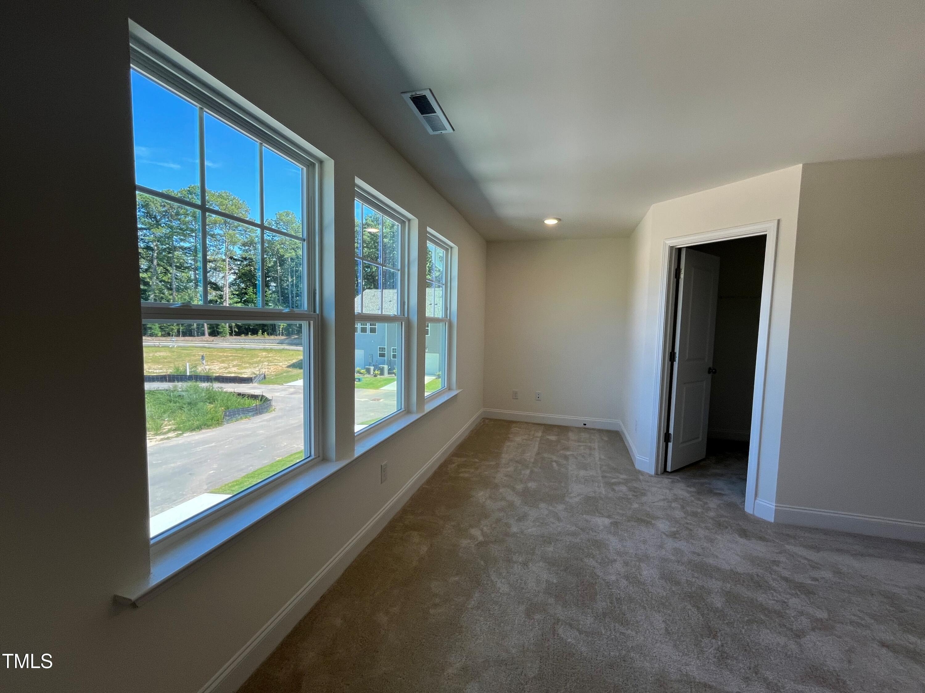 6125 Arsenal Avenue Raleigh, NC 27610 - Photo 25 of 49 Large back widows for Primary Suite
