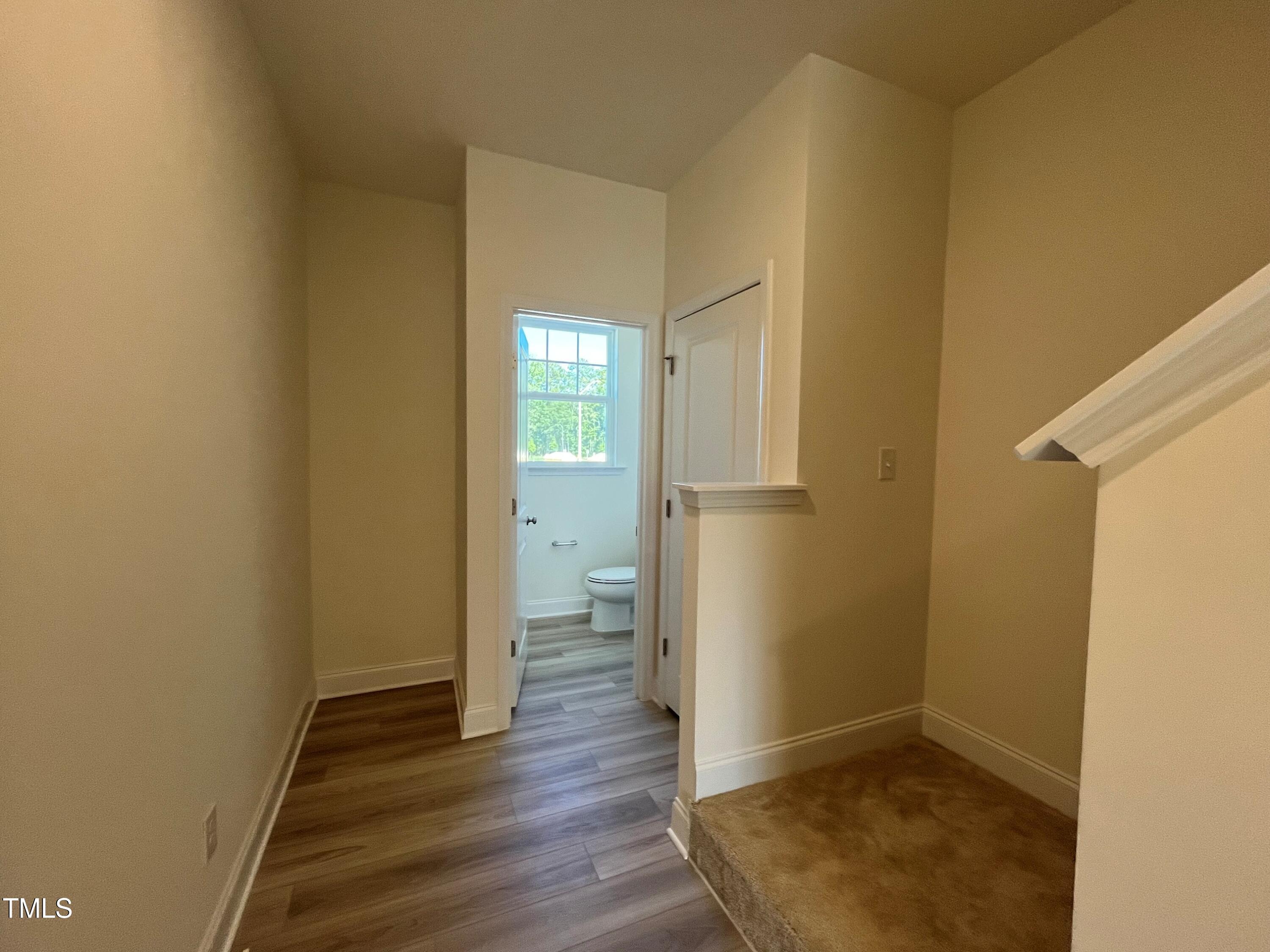 6125 Arsenal Avenue Raleigh, NC 27610 - Photo 10 of 49 Back foyer/off garage