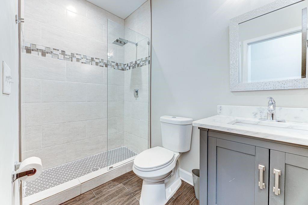 1922 Brannen Road Southeast Atlanta, GA 30316 - Photo 17 of 21 a bathroom with a sink toilet and shower