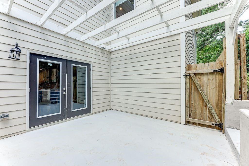 1922 Brannen Road Southeast Atlanta, GA 30316 - Photo 21 of 21 a view of a patio with table and chairs