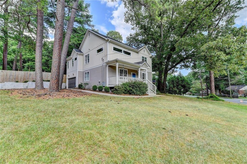 1922 Brannen Road Southeast Atlanta, GA 30316 - Photo 3 of 21 a front view of a house with a garden