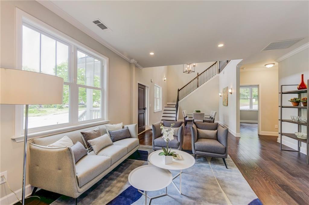 1922 Brannen Road Southeast Atlanta, GA 30316 - Photo 4 of 21 a living room with furniture and a large window