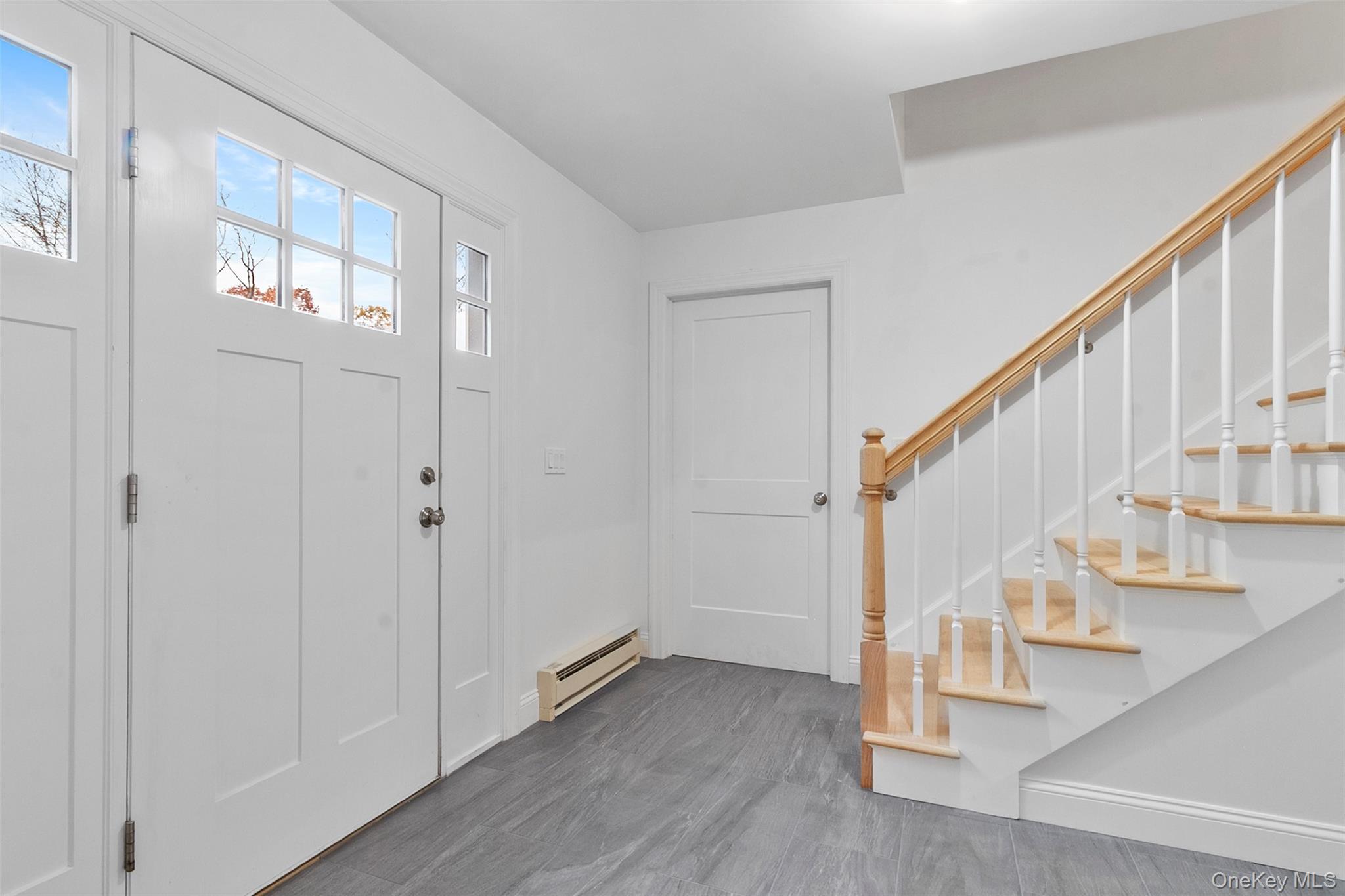 7 Tulip Road Lincolndale, NY 10541 - Photo 11 of 24 a view of entryway with wooden floor and stairs