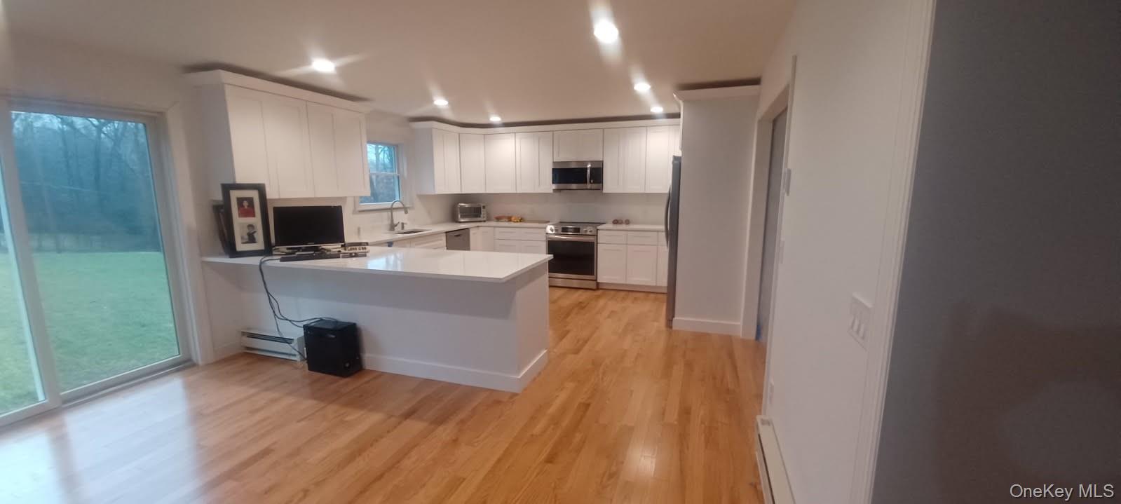 7 Tulip Road Lincolndale, NY 10541 - Photo 2 of 24 a large kitchen with a sink stainless steel appliances and counter space