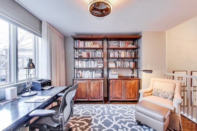 55 West Goethe Street, Unit 1233 Chicago, IL 60610 - Photo 17 of 31 a living room with furniture and a window