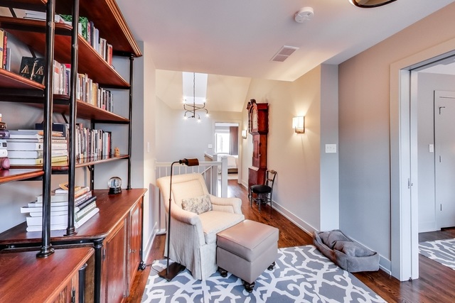 55 West Goethe Street, Unit 1233 Chicago, IL 60610 - Photo 18 of 31 a living room with furniture