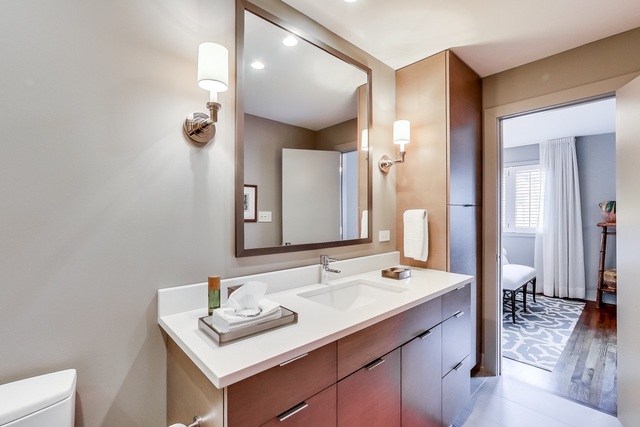55 West Goethe Street, Unit 1233 Chicago, IL 60610 - Photo 22 of 31 a bathroom with a sink and a mirror