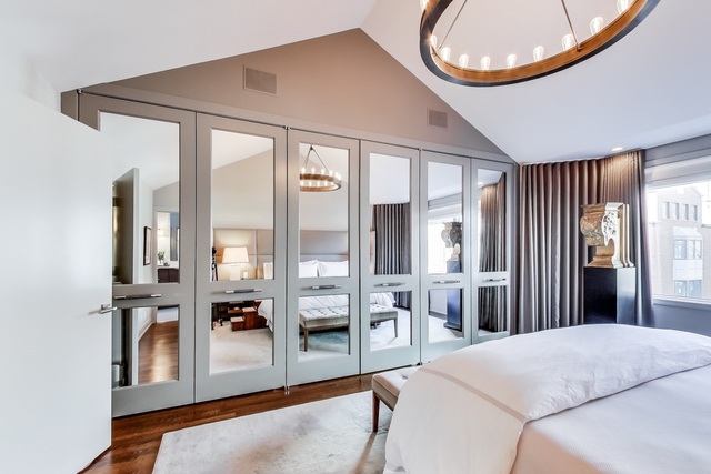 55 West Goethe Street, Unit 1233 Chicago, IL 60610 - Photo 25 of 31 a bedroom with furniture and large windows