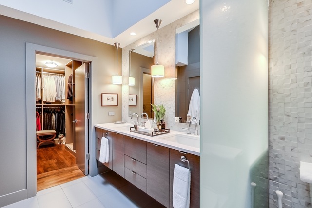 55 West Goethe Street, Unit 1233 Chicago, IL 60610 - Photo 26 of 31 a bathroom with a double vanity sink and a mirror
