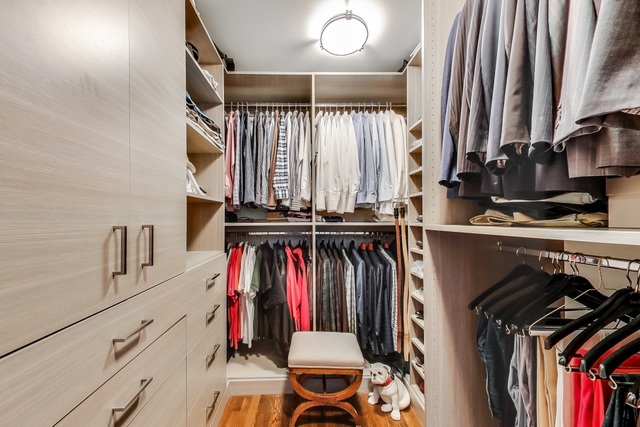 55 West Goethe Street, Unit 1233 Chicago, IL 60610 - Photo 28 of 31 a view of walk in closet with clothes and shoes