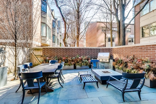 55 West Goethe Street, Unit 1233 Chicago, IL 60610 - Photo 29 of 31 a view of a patio with couple of chairs