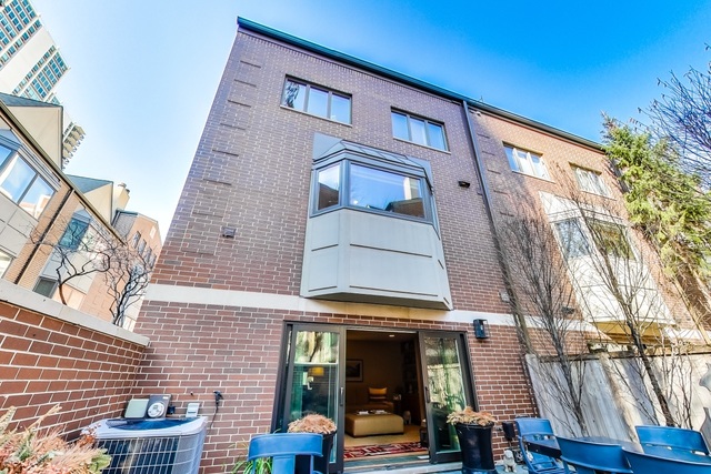 55 West Goethe Street, Unit 1233 Chicago, IL 60610 - Photo 31 of 31 a front view of a building with outdoor seating