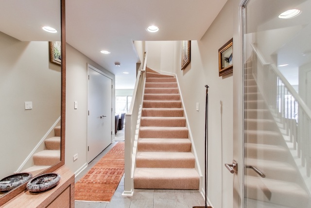 55 West Goethe Street, Unit 1233 Chicago, IL 60610 - Photo 4 of 31 a view of an entryway with wooden floor